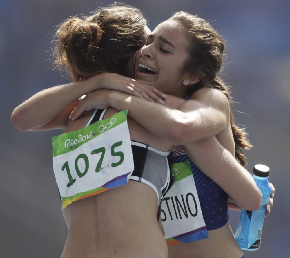 New Zealand's Nikki Hamblin, left, and United States' Abbey D'Agostino after competing in a women's 5000-meter heat during the athletics competitions of the 2016 Summer Olympics. (David J. Phillip/AP)
