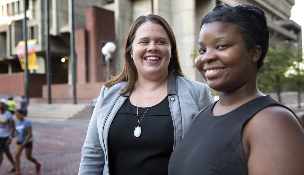 Megan Costello (left), Executive Director of the Mayor's Office of Women's Advancement, and Kristina Desir, Program Manager for AAUW Work Smart in Boston, near city hall. (Robin Lubbock/WBUR)