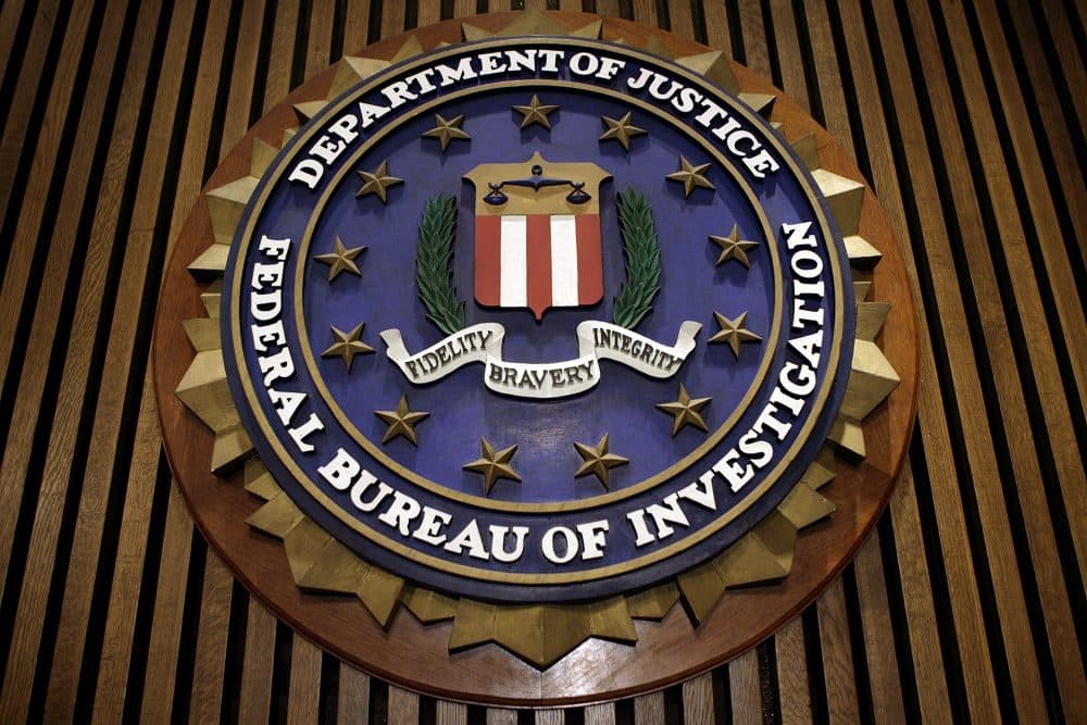 The seal of the FBI hangs in the Flag Room at the bureau's headquarters in Washington D.C. (Chip Somodevilla/Getty Images)