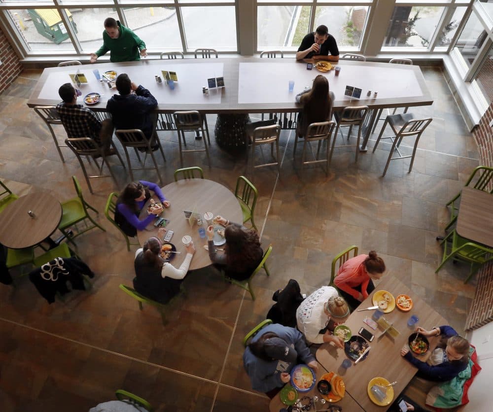 Students at the University of New Hampshire have lunch at a campus dining hall in April 2016 in Durham, N.H. (Jim Cole/AP)