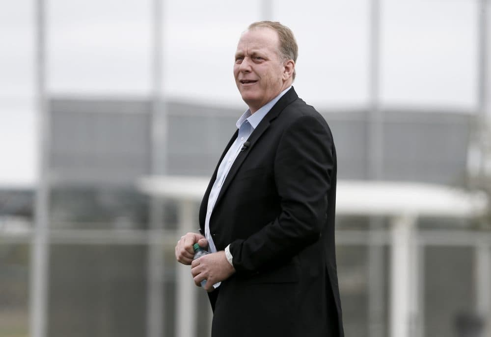 Curt Schilling, then a baseball broadcast analyst, watches as the Red Sox work out Feb. 25, 2015 at baseball spring training in Fort Myers Fla. (Tony Gutierrez/AP)