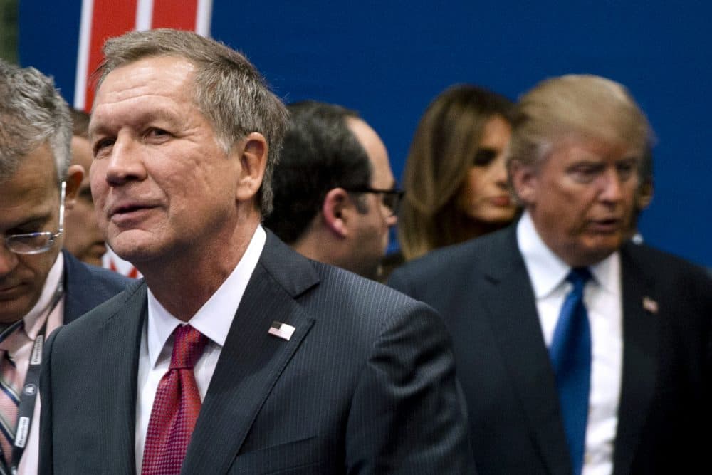 In this Feb. 6 file photo, Ohio Gov. John Kasich, left, and Donald Trump, right, speak to reporters after a Republican presidential primary debate at Saint Anselm College in Manchester, N.H. (/Matt Rourke/AP)