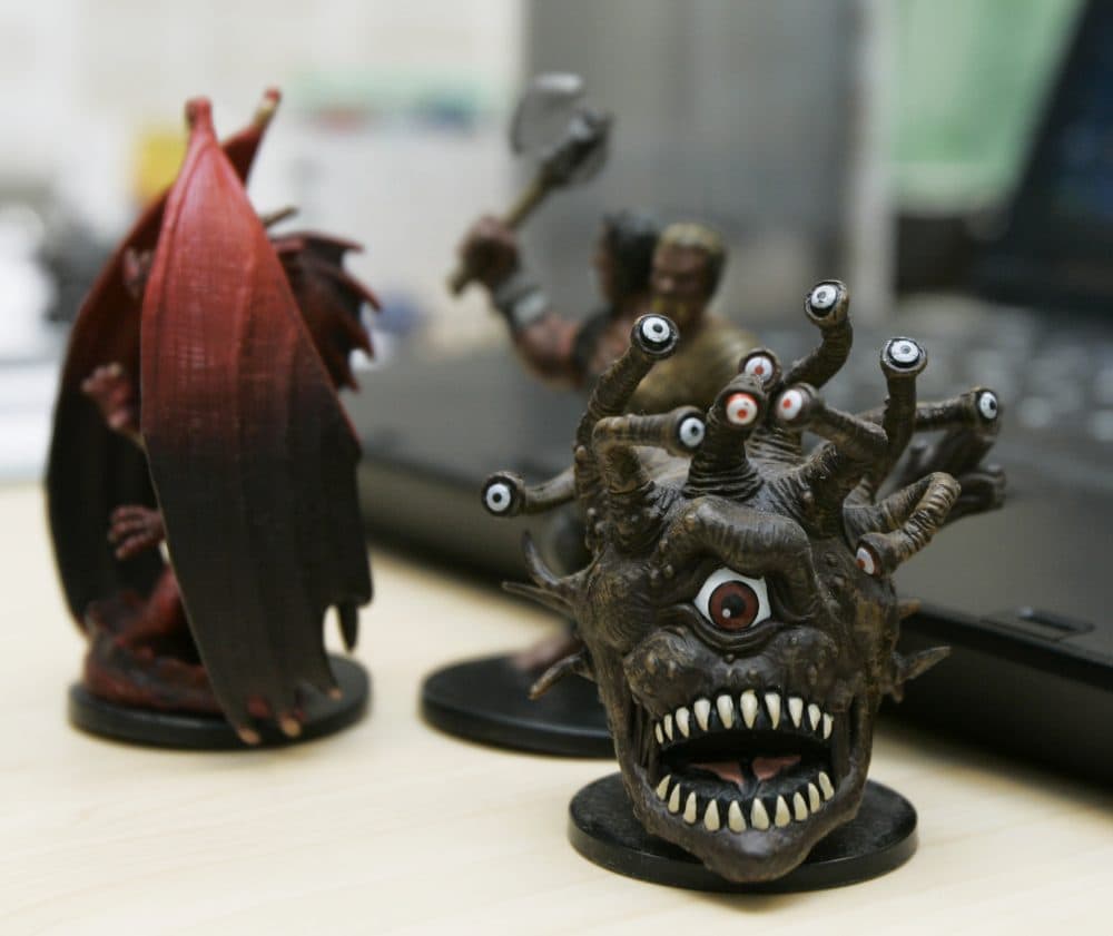 Miniature figures used in the Dungeons and Dragons roleplaying game. Pop culture writer Ethan Gilsdorf says that the plot line in the new 'Stranger Things' Netflix series takes inspiration from the board game, (Ted S. Warren/AP)
