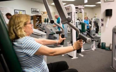 Anne Reel, 61, works out at the Quincy College gym on a busy weekday morning. (Robin Lubbock/WBUR)