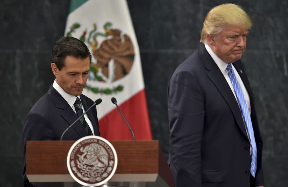 Republican presidential nominee Donald Trump (R) and Mexican President Enrique Pena Nieto prepare to deliver a joint press conference in Mexico City on Aug. 31, 2016. (Yuri Cortez/AFP/Getty Images)