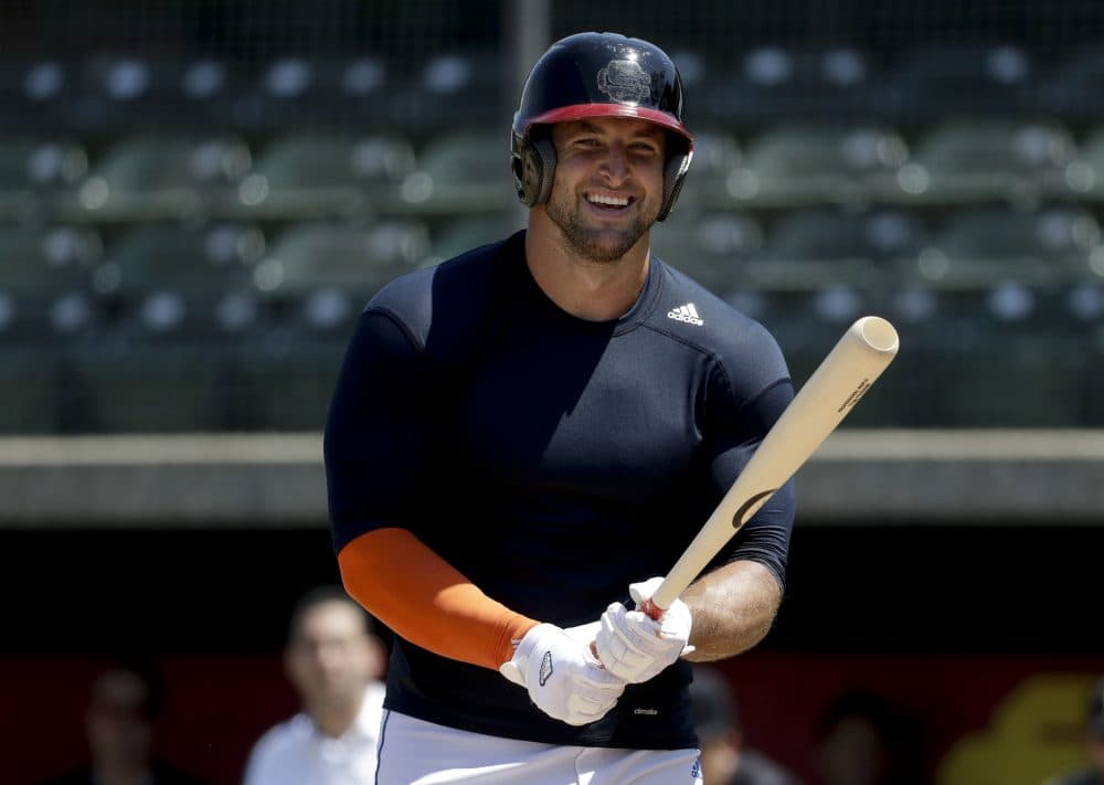After a short career in the NFL, Tim Tebow is giving baseball a shot -- a sport he hasn't played regularly since high school. (Chris Carlson/AP)