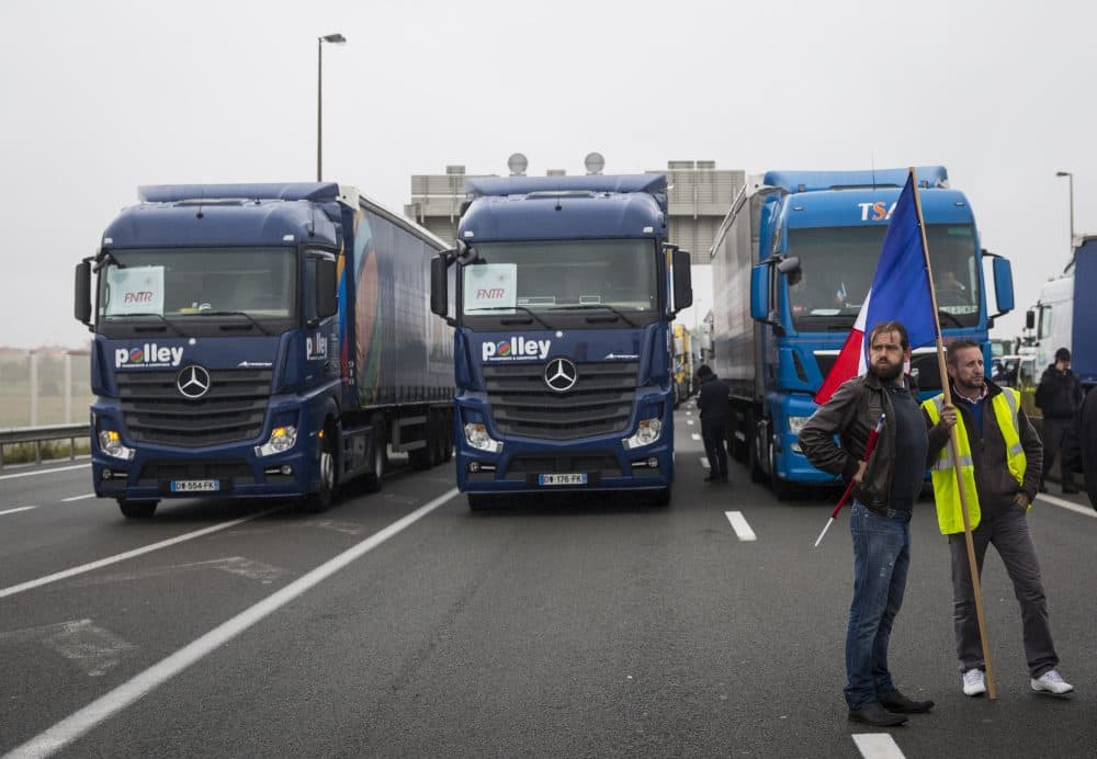 A convoy of farmers, French businesses owners and locals blockade the main road into the Port of Calais as they protest against a migrant camp on Sept. 5, 2016 in Calais, France. (Jack Taylor/Getty Images)