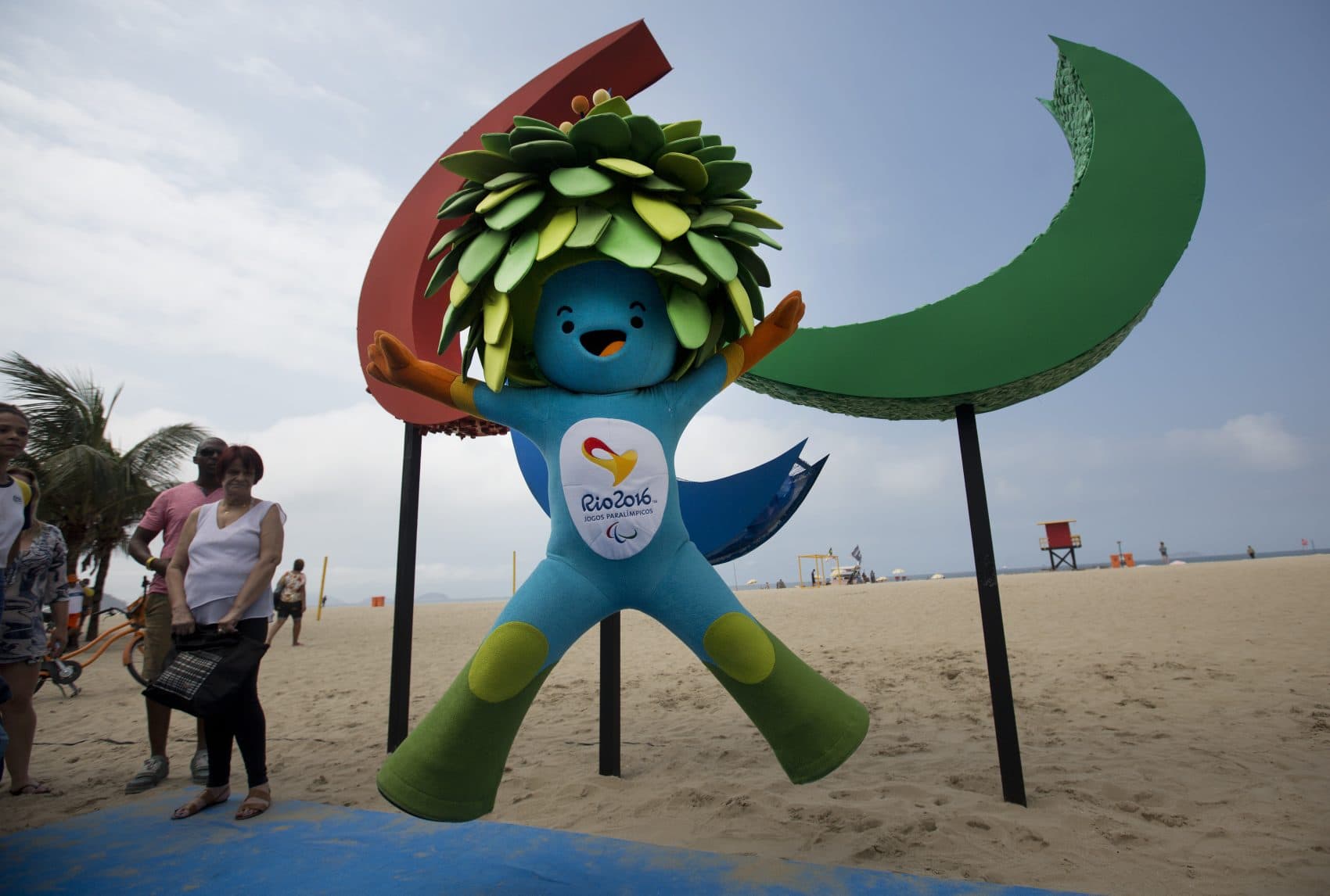 Tom, the mascot of the Rio Paralympics Games, jumps in front of the sculpture of Agitos, symbol of the Paralympic Games, on Copacabana beach in Rio de Janeiro. (Silvia Izquierdo/AP)