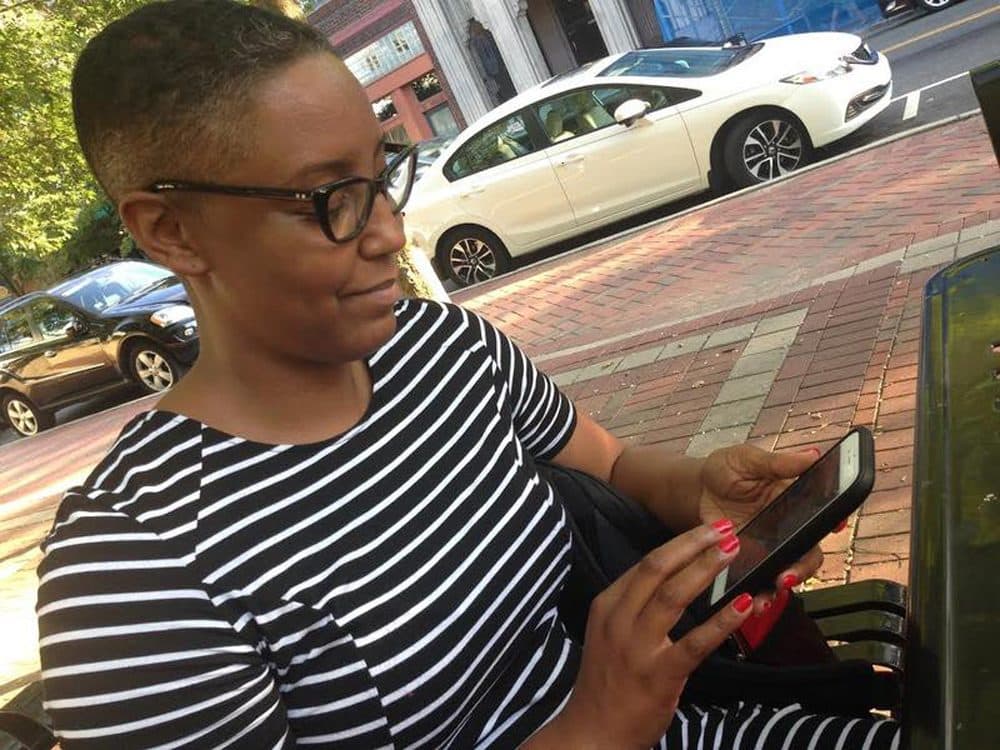 Cicely Mitchell, of Durham, recently opened an account at black-owned Mechanics and Farmers Bank in Durham. On Facebook, she challenged her friends to do the same. (Leoneda Inge/WUNC)