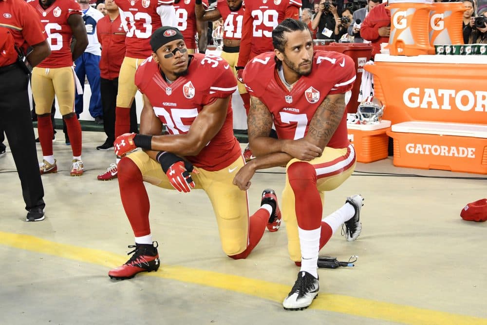 &quot;But then a big change happened -- didn't seem like much, but by my estimation, changed everything. Instead of sitting, Kaepernick kneeled.&quot; (Thearon W. Henderson/Getty Images)