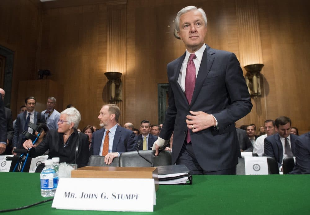 John Stumpf, chairman and CEO of Wells Fargo, arrives to testify about the unauthorized opening of accounts by Wells Fargo during a Senate Banking, Housing and Urban Affairs Committee hearing on Capitol Hill in Washington, D.C., Sept. 20, 2016. (Saul Loeb/AFP/Getty Images)