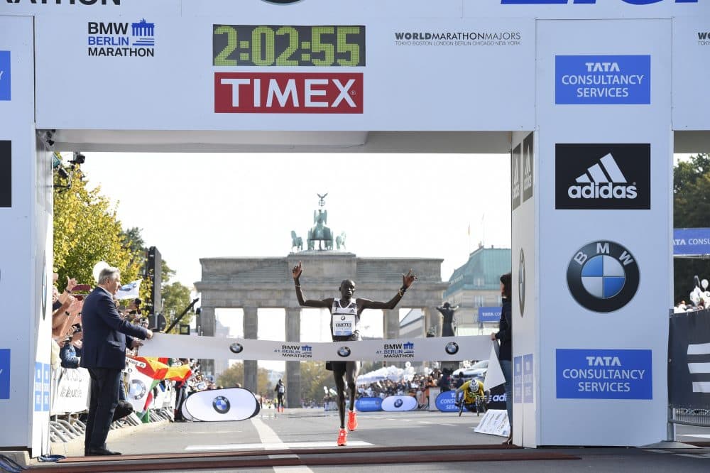Kenya's Dennis Kimetto crosses the finish line to win the 41th edition of the Berlin Marathon in Berlin on Sept. 28, 2014. Kimetto broke the world marathon record. (Tobias Schwarz/AFP/Getty Images)
