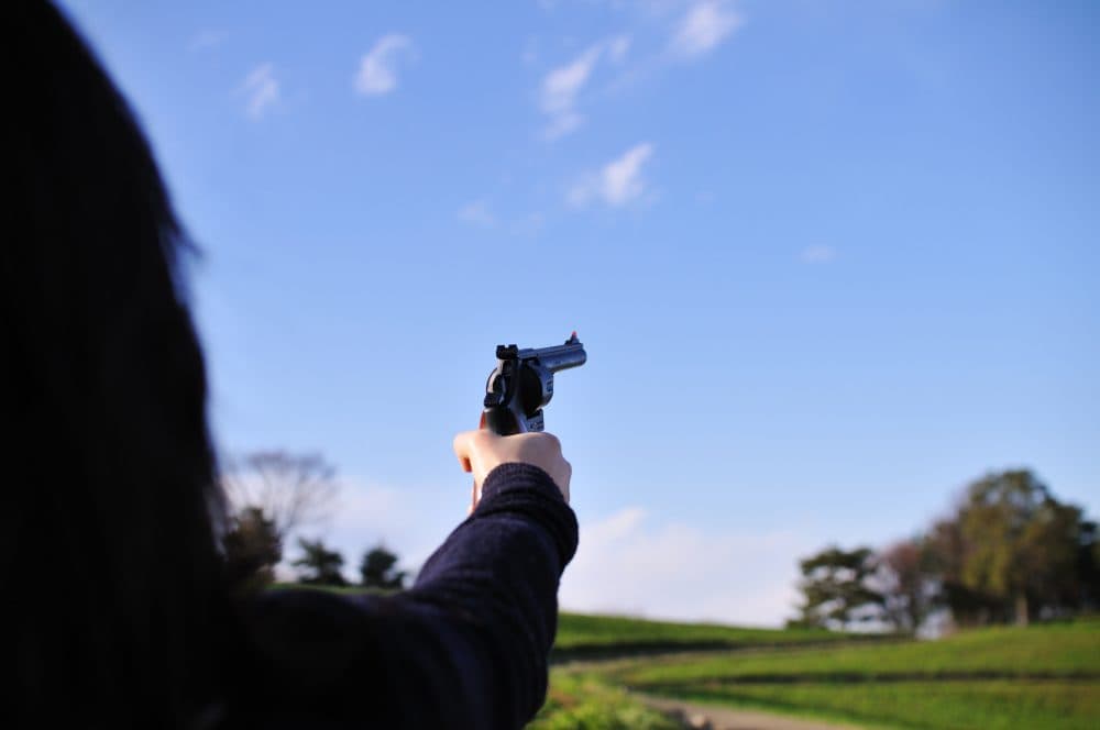 The Northeastern/Harvard survey found that women were more likely to own a gun for self-defense than men. (Ajari/Flickr)
