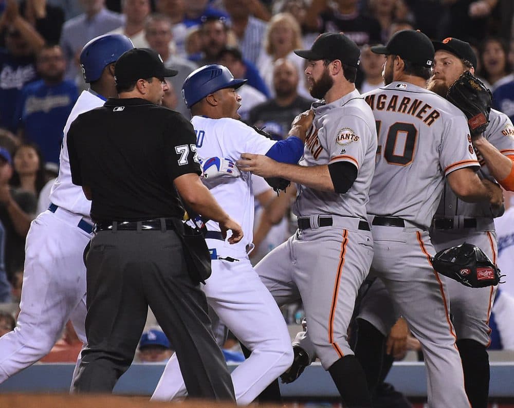 Giants pitcher Madison Bumgarner started a bench-clearing brawl on Monday night by repeatedly screaming at Yasiel Puig of the Dodgers for looking at him. The Dodgers responded by showed up on Twitter in T-shirts reading “Don’t Look At Me.” (Jayne Kamin-Oncea/Getty Images)