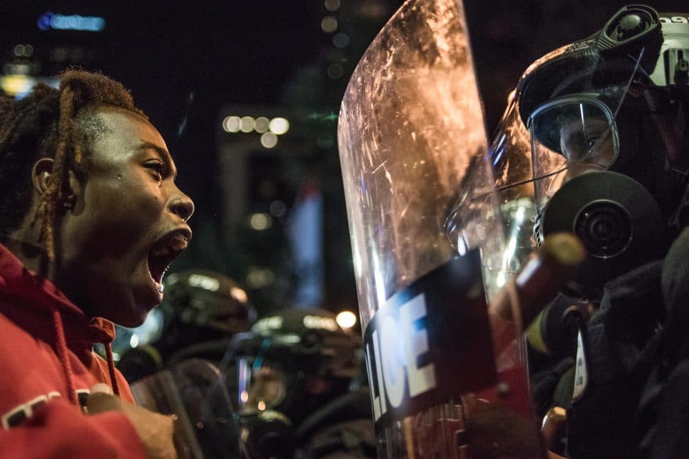 A demonstrator shouts at law enforcement during protests on Sept. 21, 2016, in Charlotte, N.C. (Sean Rayford/Getty Images)