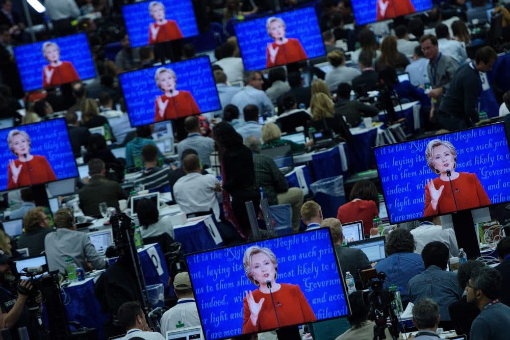 Democratic presidential nominee Hillary Clinton is seen on multiple screens speaking during the first presidential debate at Hofstra University on Sept. 26, 2016, in Hempstead, N.Y. (Brendan Smialowski/AFP/Getty Images)