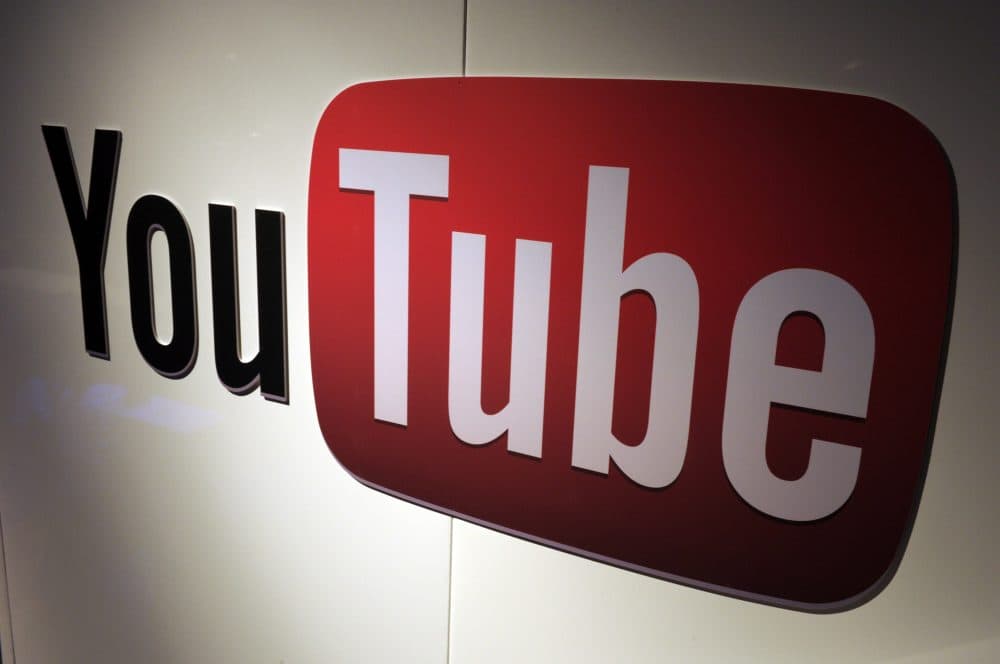 Some YouTube filmmakers say the way the company shares its ad revenue is problematic. (Eric Piermont/Getty Images)