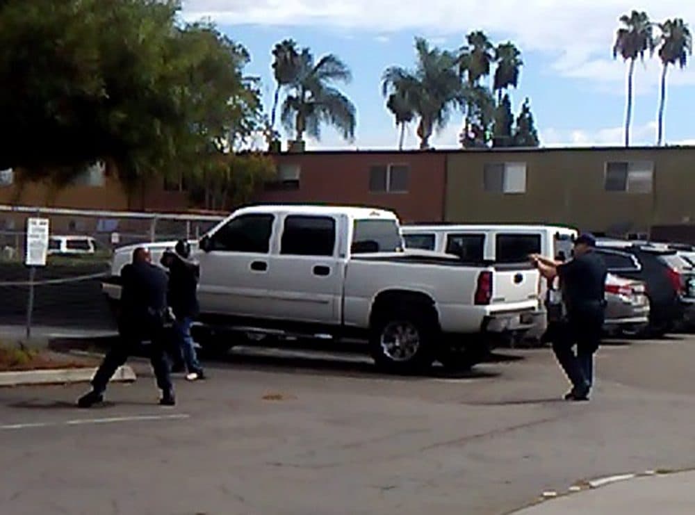 El Cajon police provided this image, which they say is a still from a bystander cell phone video of the shooting of an unarmed black man on Tuesday. (El Cajon Police Department)