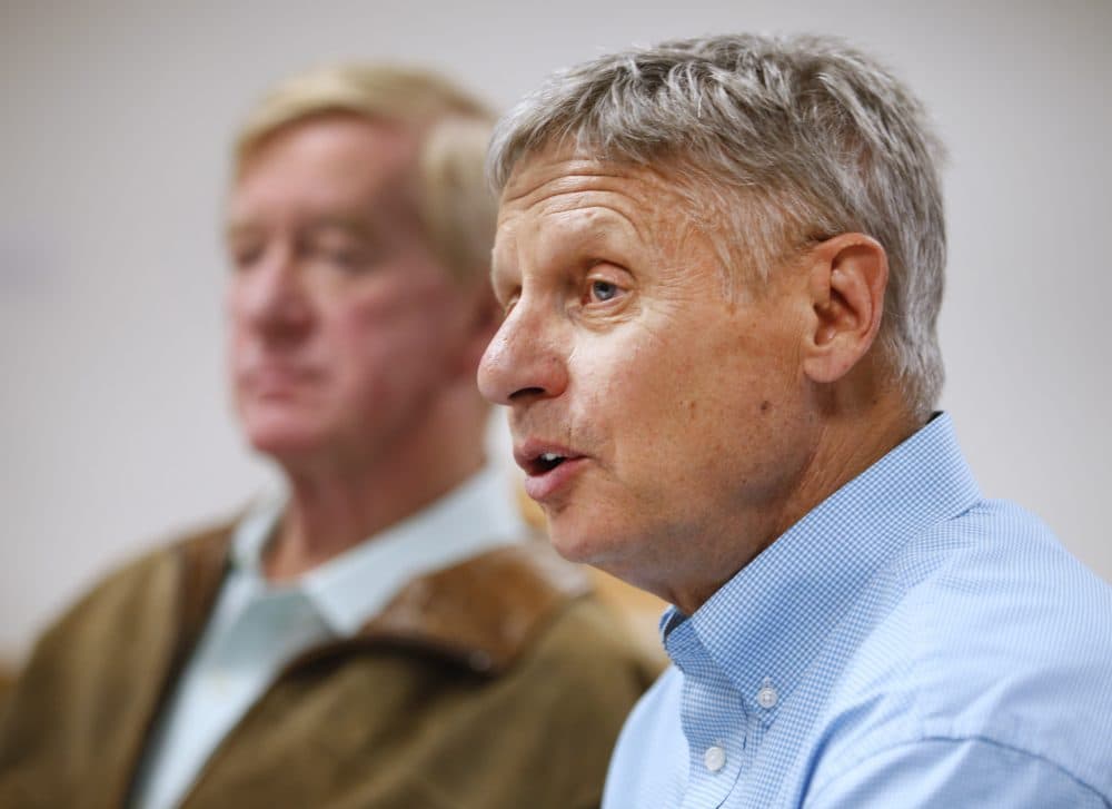 Libertarian presidential candidate Gary Johnson (R), and his running mate Bill Weld (L), talk to the press before a rally on Aug. 6, 2015 in Salt Lake City. (George Frey/Getty Images)