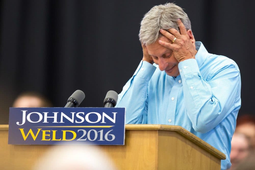 Libertarian presidential candidate Gary Johnson reacts as his microphone stops working during a campaign rally, Saturday, Sept. 3, 2016, at Grand View University in Des Moines, Iowa. (Scott Morgan/AP)