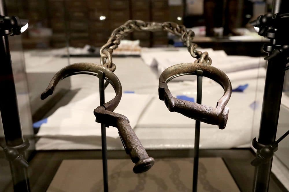 A pair of slave shackles on display in the Slavery and Freedom Gallery in the Smithsonian's National Museum of African American History and Culture on Sept. 14, 2016, in Washington. (Chip Somodevilla/Getty Images)