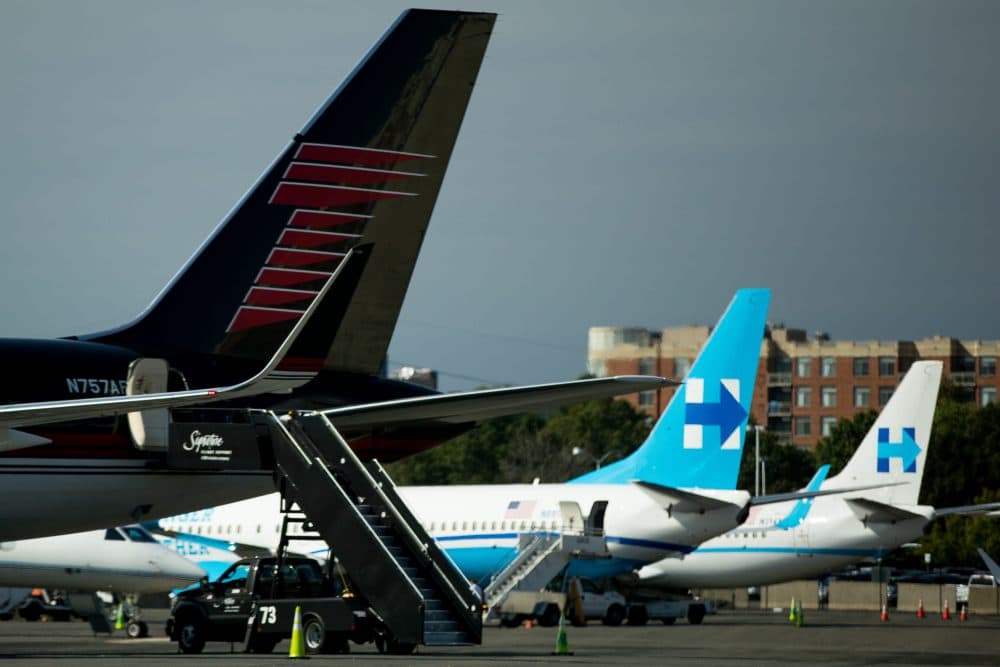 The campaign planes for Hillary Clinton and Donald Trump are parked nearby each other on the tarmac at Washington's Ronald Reagan National Airport on Friday. (Andrew Harnik/AP)