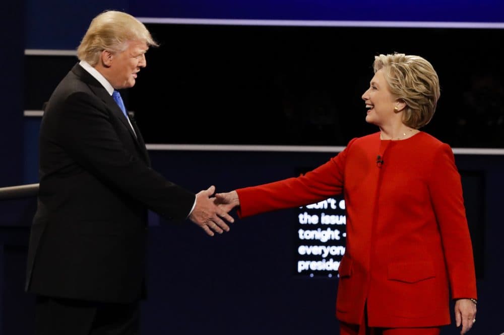 Republican presidential nominee Donald Trump and Democratic presidential nominee Hillary Clinton shake hands during the presidential debate at Hofstra University in New York Monday. (David Goldman/AP)