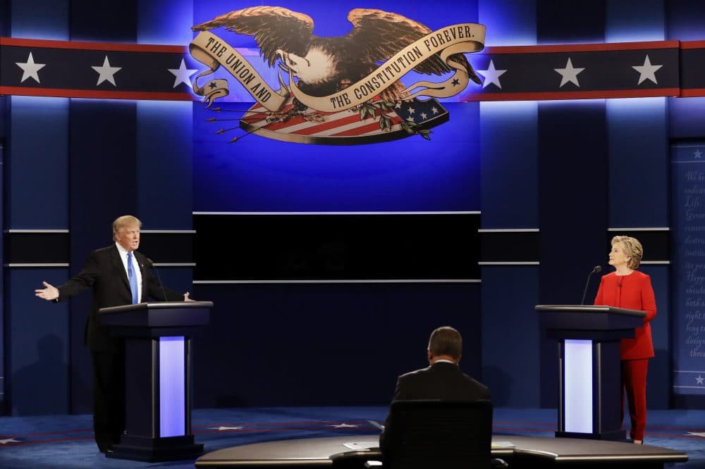 Donald Trump and Hillary Clinton are seen on stage during the first presidential debate Monday night in New York. (David Goldman/AP)