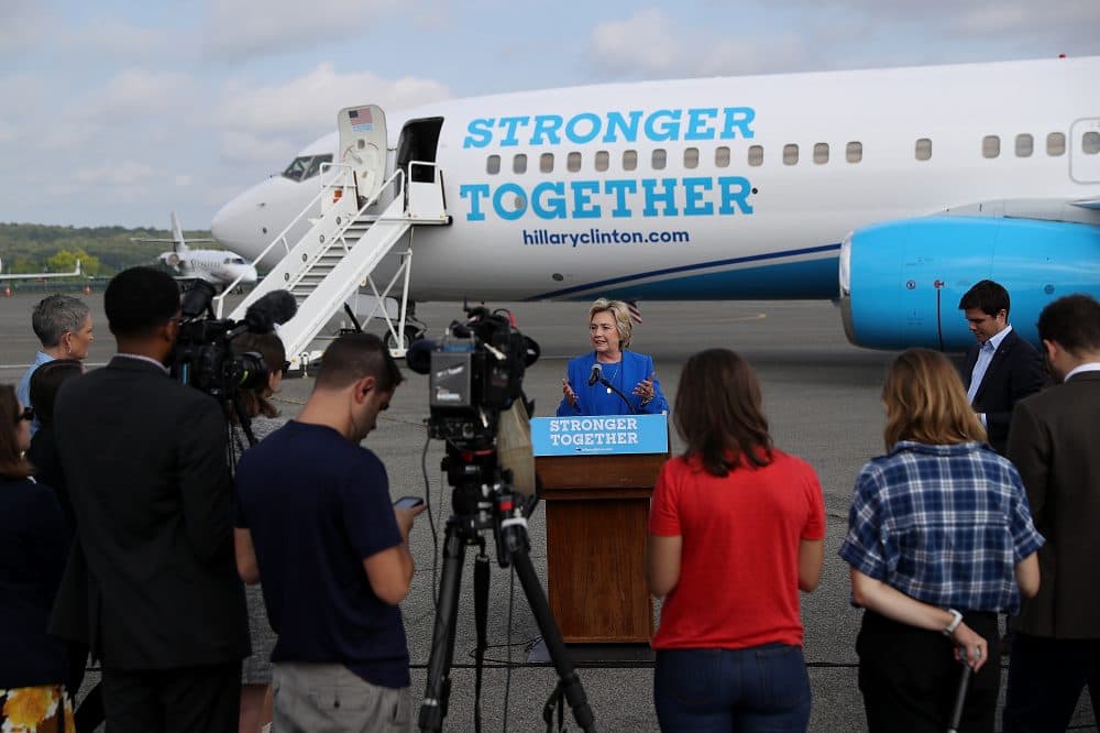 Democratic presidential nominee Hillary Clinton speaks to reporters on the tarmac at Westchester County Airport on Sept. 8, 2016 in White Plains, New York, before leaving for North Carolina and Missouri to campaign. (Justin Sullivan/Getty Images)