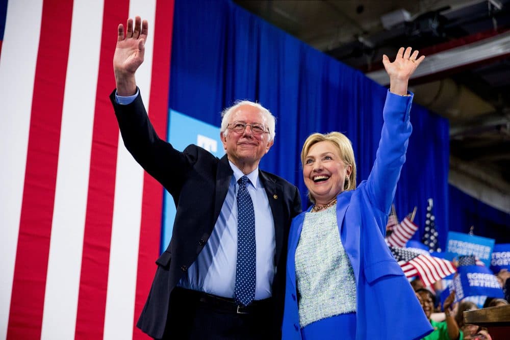 Former rivals Bernie Sanders and Hillary Clinton in July 2016. (Andrew Harnik/AP file)