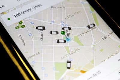 Uber is offering a flat-rate pricing plan to customers in six cities in the US. Boston is one of them. (Mary Altaffer/AP)