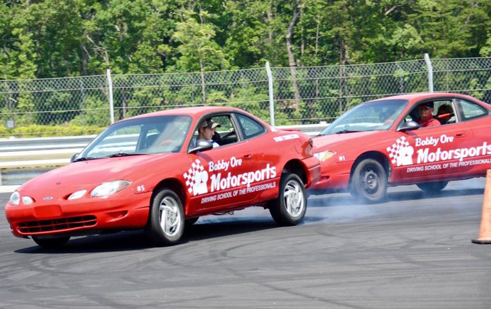 Bobby Ore leads another session at his stunt driving school at Atlanta Motorsports Park in Dawsonville, Ga. (Courtesy Bobby Ore Motorsports)
