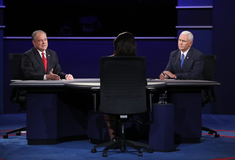 Democratic vice presidential nominee Tim Kaine (left) speaks as Republican vice presidential nominee Mike Pence (right) and debate moderator Elaine Quijano (center) listen during the vice-presidential debate at Longwood University on Oct. 4, 2016 in Farmville, Va. (Mark Wilson/Getty Images)