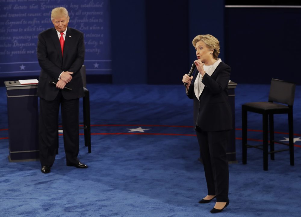 Republican presidential nominee Donald Trump listens to Democratic presidential nominee Hillary Clinton during the second presidential debate at Washington University in St. Louis, Sunday, Oct. 9, 2016. (Patrick Semansky/AP)