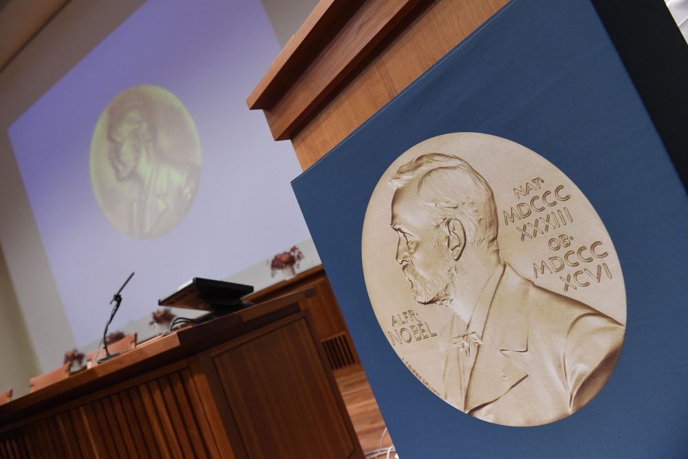 A portrait of Swedish inventor and scholar Alfred Nobel can be seen on the speaker's desk at the Nobel Forum in Stockholm, prior to the announcement of the Nobel Prize in Medicine on Oct. 3, 2016. (Jonathan Nackstrand/AFP/Getty Images)