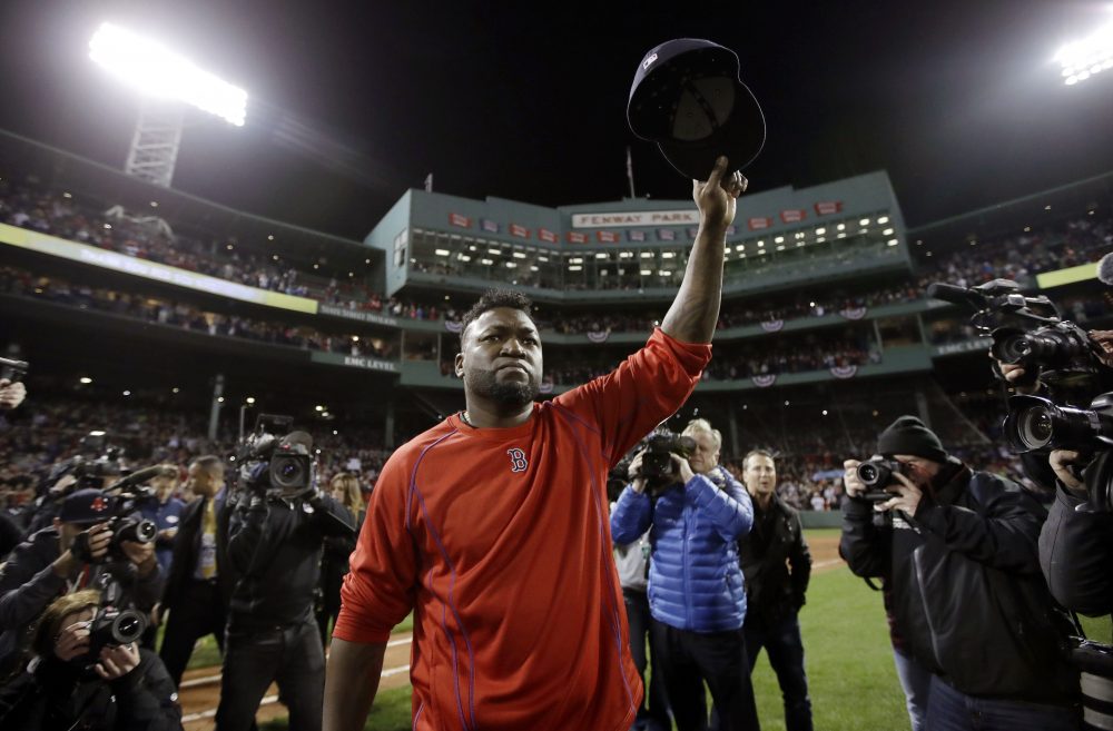 Boston Red Sox's David Ortiz waves from the field at Fenway Park after Game 3 of baseball's American League Division Series against the Cleveland Indians in Boston. (Charles Krupa/AP)
