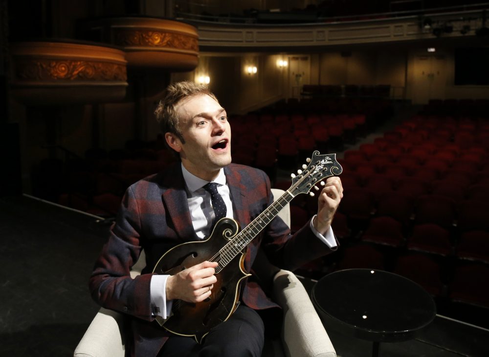 Chris Thile at the Fitzgerald Theater in St. Paul, Minn. Thile is replacing Garrison Keillor as host of &quot;A Prairie Home Companion&quot; after Keillor retired this summer. (Ann Heisenfelt/AP)