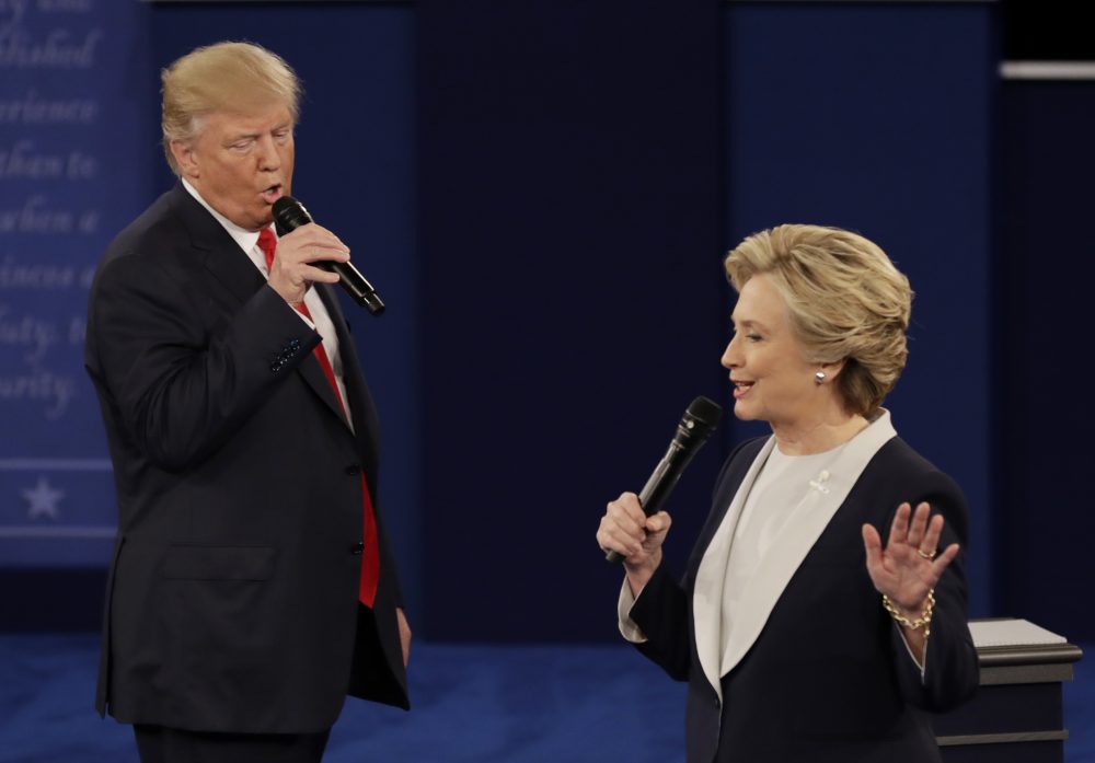 In this Sunday, Oct. 9, 2016, file photo, Republican presidential nominee Donald Trump and Democratic presidential nominee Hillary Clinton speak during the second presidential debate at Washington University in St. Louis. (Patrick Semansky/AP)