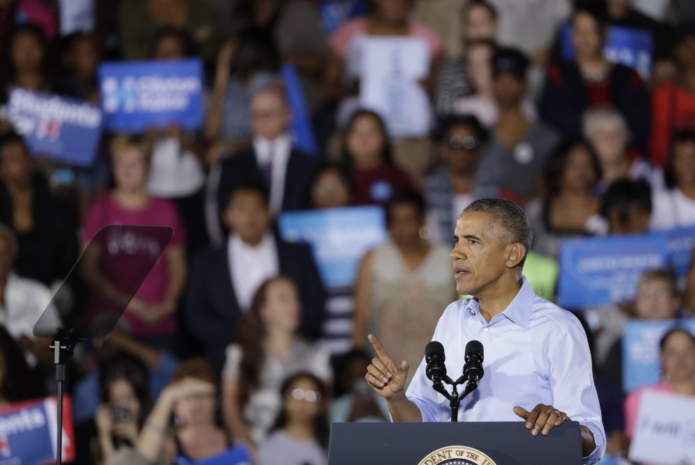 President Barack Obama speaks at a rally Sunday, Oct. 23, 2016, in North Las Vegas, Nev. Obama was in Nevada to boost Hillary Clinton's presidential campaign and help Democrats in their bid to retake control of the Senate. (John Locher/AP)