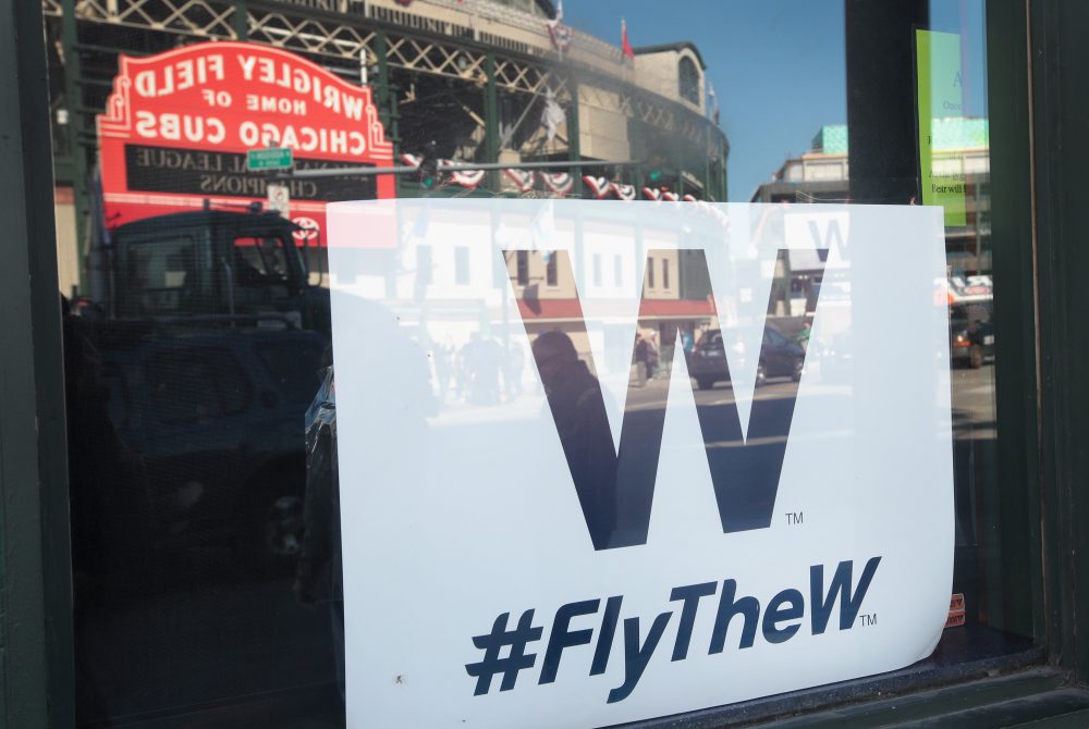 A &quot;W&quot; flag hangs in the window of a bar across from Wrigley Field, the home of the Chicago Cubs, on Oct. 24, 2016 in Chicago. (Scott Olson/Getty Images)