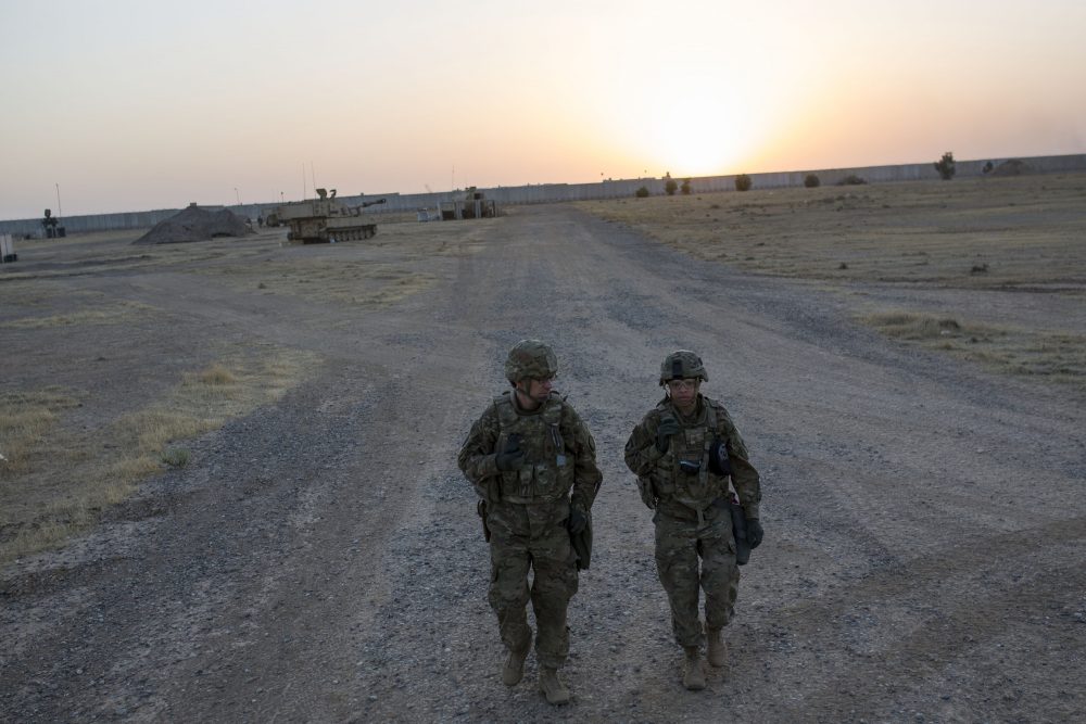 U.S. soldiers walk at the Qayyarah military base during the ongoing operation to recapture Mosul, the last major Iraqi city under the control of the Islamic State (IS) group jihadists, on Oct. 20, 2016. (Yasin Akgul/AFP/Getty Images)