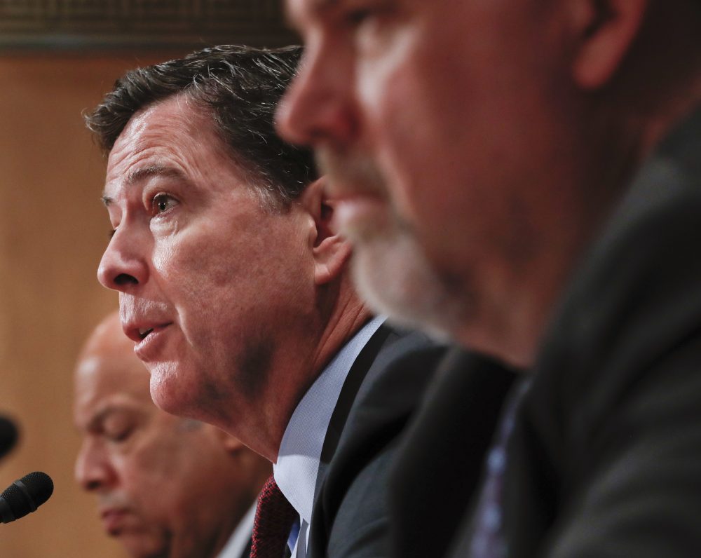 FBI Director James Comey, center, testifies on Capitol Hill in Washington in September. (Pablo Martinez Monsivais/AP)