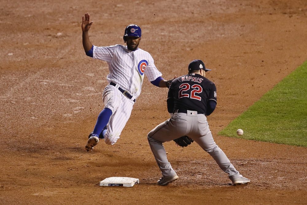 Dexter Fowler of the Chicago Cubs steals second base past Jason Kipnis of the Cleveland Indians in the seventh inning in Game 5 of the 2016 World Series at Wrigley Field on Oct. 30, 2016 in Chicago. (Ezra Shaw/Getty Images)