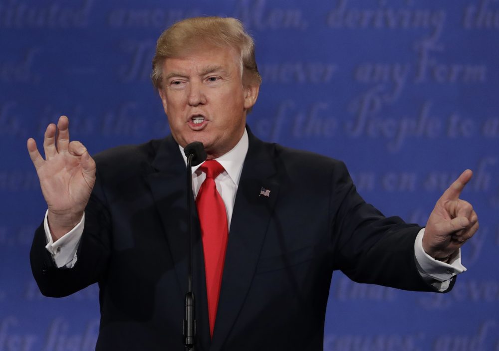 At the debate in Las Vegas Thursday night, Donald Trump would not say if he would accept the results of the election in November. (David Goldman/AP)