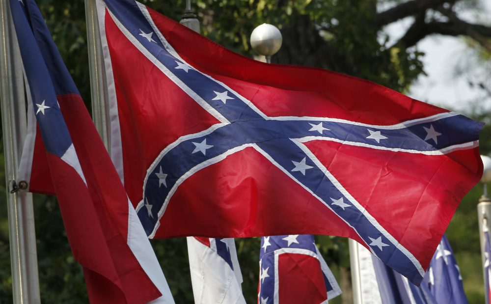 We don’t talk about these issues enough as adults, writes Neema Avashia. Which means that young people are left to make meaning on their own. Often, then, they end up making the wrong meaning. Pictured: Confederate battle flags fly outside the museum at the Confederate Memorial Park in Mountain Creek, Ala. (Dave Martin/AP)