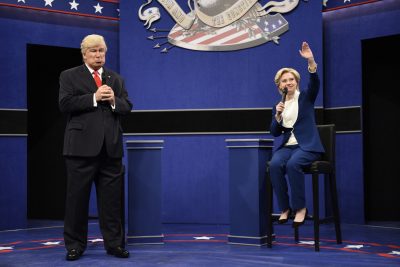 In this photo provided by NBC, Alec Baldwin, left, as Republican presidential candidate, Donald Trump, and Kate McKinnon, as Democratic presidential candidate, Hillary Clinton, perform during the during the &quot;Debate Cold Open&quot; sketch.(Will Heath/NBC via AP)