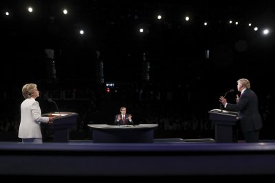 Democratic presidential nominee Hillary Clinton listen as Republican presidential nominee Donald Trump answers Moderator Chris Wallace's question during the third presidential debate at UNLV in Las Vegas. (Joe Raedle/AP)