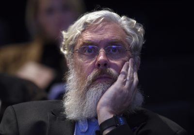 Harvard Medical School's George Church listens to a panel discussion at the National Academy of Sciences international summit on the safety and ethics of human gene editing in Washington, on Dec. 1, 2015. (Susan Walsh/AP)