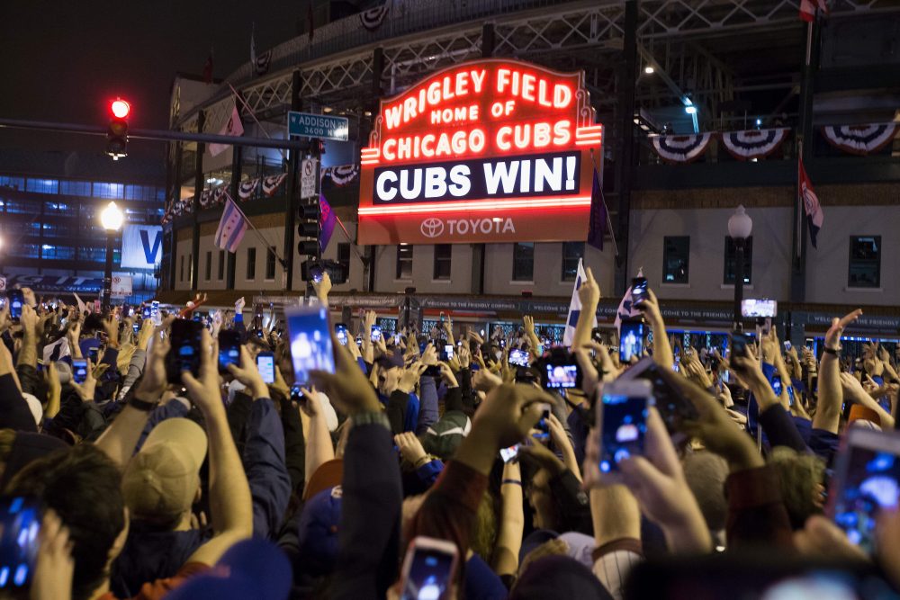 Chicago Cubs fans Fly the W as long as they can