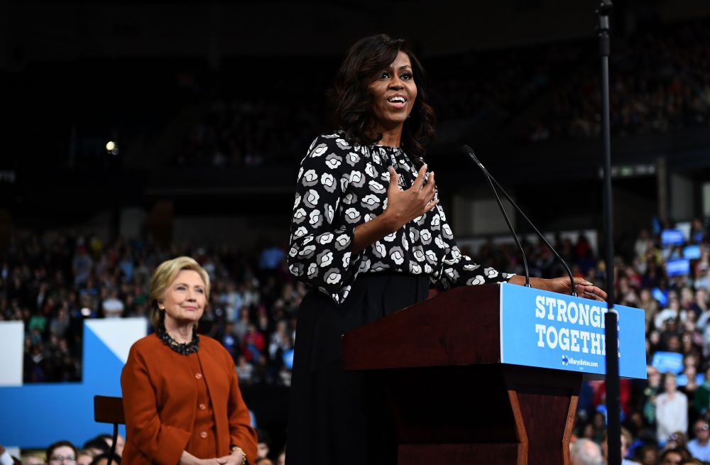 First Lady Michelle Obama speaks as Democratic presidential nominee Hillary Clinton listens during a campaign rally in Winston-Salem, N.C., on Oct. 27, 2016. (Jewel Samad/AFP/Getty Images)